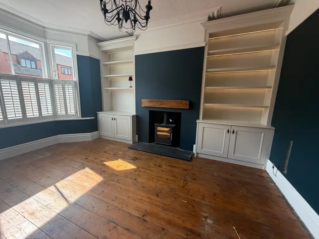 Completed pair of built in bookcases after being sprayed